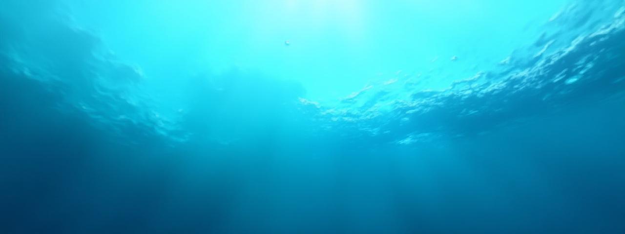 Tekstur abstrak laut dalam dengan buih dan gradien biru.