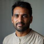 Potret Rajesh, Pakar Terapi Badan & Relaksasi, memancarkan ketenangan.